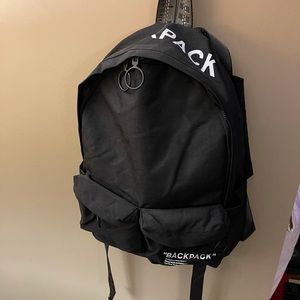 Off-white “Back Pack” in black. New with tags.
